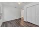 Clean bedroom featuring wood-look floors, closet and windows at 1040 20Th St, Orlando, FL 32805