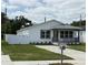 Well-maintained home featuring fresh exterior paint, fenced yard, and updated hardscape driveway at 1040 20Th St, Orlando, FL 32805