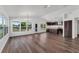 Spacious living room with luxury vinyl plank flooring, bright windows, and an open-concept design at 1040 20Th St, Orlando, FL 32805
