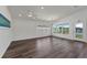 Living room with a ceiling fan, recessed lights, hardwood flooring, and lots of natural light at 1040 20Th St, Orlando, FL 32805