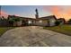 Charming single-story home with a well-maintained yard and ample driveway space perfect for suburban living at 10934 Tangora St, Orlando, FL 32825