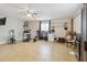 Large flex room with gym, exercise equipment, overhead ceiling fan, and tile flooring at 10934 Tangora St, Orlando, FL 32825