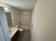 Bathroom with a combination tub and shower, and a single sink vanity at 1115 Fidelma Ct, Orlando, FL 32824