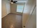 Bedroom featuring plank flooring, a ceiling fan, and a double-door closet at 1115 Fidelma Ct, Orlando, FL 32824