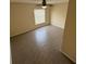 Bedroom featuring plank flooring, a ceiling fan, and a window at 1115 Fidelma Ct, Orlando, FL 32824
