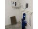 Utility room containing an ECO Smart water heater and water filtration system at 1115 Fidelma Ct, Orlando, FL 32824