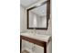 Bathroom featuring a modern vanity with a large mirror and stylish fixtures at 1130 Washington Ave # 11, Winter Park, FL 32789