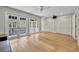 Bonus room with wood floors, French doors leading to an outdoor space, and ample closet space at 1130 Washington Ave # 11, Winter Park, FL 32789