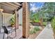 Charming courtyard with brick columns, seating, and a quaint garden, creating an inviting outdoor space at 1130 Washington Ave # 11, Winter Park, FL 32789
