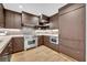Chef's kitchen featuring high-end appliances, custom cabinetry, and a functional layout is perfect for culinary enthusiasts at 1130 Washington Ave # 11, Winter Park, FL 32789