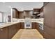 Modern kitchen with custom wood cabinetry, stainless steel appliances, and sleek countertops offers a gourmet cooking experience at 1130 Washington Ave # 11, Winter Park, FL 32789