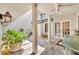Private courtyard patio with stone pavers and comfortable outdoor seating at 1130 Washington Ave # 11, Winter Park, FL 32789