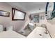 Bathroom featuring modern tub, stylish sink, and unique architectural details at 1200 Auger Dr, New Smyrna Beach, FL 32168