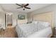 Spacious bedroom with natural light, hardwood floors, and a neutral color palette at 1210 Maury Rd # 3, Orlando, FL 32804