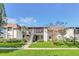 Well-maintained condo exterior with manicured lawn and inviting entrance at 1210 Maury Rd # 3, Orlando, FL 32804