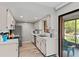 Kitchen features stainless steel appliances and ample counter space adjacent to outdoor access at 1210 Maury Rd # 3, Orlando, FL 32804