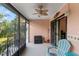 Relaxing screened patio with ceiling fan, offering a peaceful outdoor space at 1210 Maury Rd # 3, Orlando, FL 32804