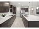 Modern kitchen features sleek countertops, stainless steel appliances, and ample cabinet space at 12966 Promise Pl, Orlando, FL 32832