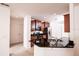 Well-appointed kitchen with dark cabinets, granite counters, and stainless steel appliances at 145 Palazzo Ln, Kissimmee, FL 34759
