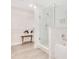 Stylish bathroom featuring white tile, glass shower, and modern fixtures at 14501 Grove Resort Ave # 2438, Winter Garden, FL 34787