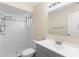 Bathroom with tiled shower, gray vanity and sink at 1550 Maxwell Ln, Deltona, FL 32738
