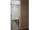 Ensuite bathroom with tiled shower and modern vanity at 1550 Maxwell Ln, Deltona, FL 32738