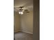 Cozy bedroom with neutral walls, carpet, and a ceiling fan for added comfort at 1550 Maxwell Ln, Deltona, FL 32738