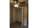 Bedroom closet with bifold doors and ample shelving for efficient storage at 1550 Maxwell Ln, Deltona, FL 32738
