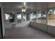 The sunroom has multiple windows and an exterior door to the backyard at 1550 Maxwell Ln, Deltona, FL 32738
