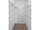 Empty walk-in closet with carpet and wire shelves at 1550 Maxwell Ln, Deltona, FL 32738