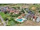 Stunning aerial view of Bella Collina showcasing beautiful residences and resort-style amenities with lush landscaping at 16124 Volterra Pt, Montverde, FL 34756