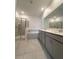 The bathroom has a soaking tub, glass shower, double vanity, and recessed lighting at 16436 Parable Way, Winter Garden, FL 34787