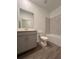 Bathroom featuring modern vanity, tub and tiled shower at 16436 Parable Way, Winter Garden, FL 34787