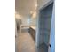 A bathroom featuring a vanity with double sinks, a bathtub, and a separate shower, plus closet at 16436 Parable Way, Winter Garden, FL 34787