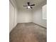 Spare bedroom with ceiling fan and plush carpet at 16436 Parable Way, Winter Garden, FL 34787