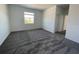 This bedroom is carpeted and includes one window and a doorway, offering a serene and private retreat at 16436 Parable Way, Winter Garden, FL 34787