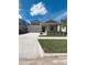 Charming two-story home with a manicured lawn, a two-car garage and stone accents at 16436 Parable Way, Winter Garden, FL 34787