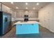 Modern kitchen with stainless steel appliances and a large island at 16436 Parable Way, Winter Garden, FL 34787