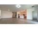 Open concept living area with tile flooring and natural light at 16436 Parable Way, Winter Garden, FL 34787