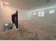 Spacious upstairs loft area with plush carpet at 16436 Parable Way, Winter Garden, FL 34787