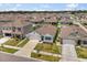 Charming single-Gathering homes featuring well-manicured lawns and attached garages in a friendly neighborhood at 1693 Barberry Dr, Kissimmee, FL 34744
