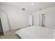 Main bedroom featuring carpet, neutral walls, window, and ceiling lights and closet at 1693 Barberry Dr, Kissimmee, FL 34744