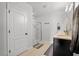 Bright bathroom with double sinks, modern fixtures, and a glass-enclosed shower for a luxurious feel at 1836 Partin Terrace Rd, Kissimmee, FL 34744