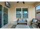 Relaxing patio area with comfortable seating, rug, and ceiling fan at 1836 Partin Terrace Rd, Kissimmee, FL 34744