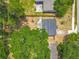 Aerial view of a home featuring a fenced yard and mature tree coverage at 1913 S Summerlin Ave, Sanford, FL 32771