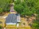 This is an aerial view of the backyard, home and trees at 1913 S Summerlin Ave, Sanford, FL 32771