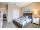 Cozy bedroom with ample natural light, closet, and adjoining bathroom access for added convenience at 1977 Walnut Creek Dr, Kissimmee, FL 34744