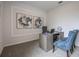 Office featuring a modern desk, comfortable chairs and bright window at 1977 Walnut Creek Dr, Kissimmee, FL 34744