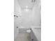 Bright bathroom features a sleek vanity with quartz counters, a bathtub and modern fixtures at 2131 Brighton Ln, Orlando, FL 32817