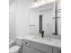 Clean bathroom with tile floors, white cabinets, and modern fixture at 2131 Brighton Ln, Orlando, FL 32817
